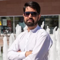 close-up-portrait-modern-pakistani-man-dark-beard-light-clothes-sunglasses-close-up-portrait-modern-pakistani-364352452